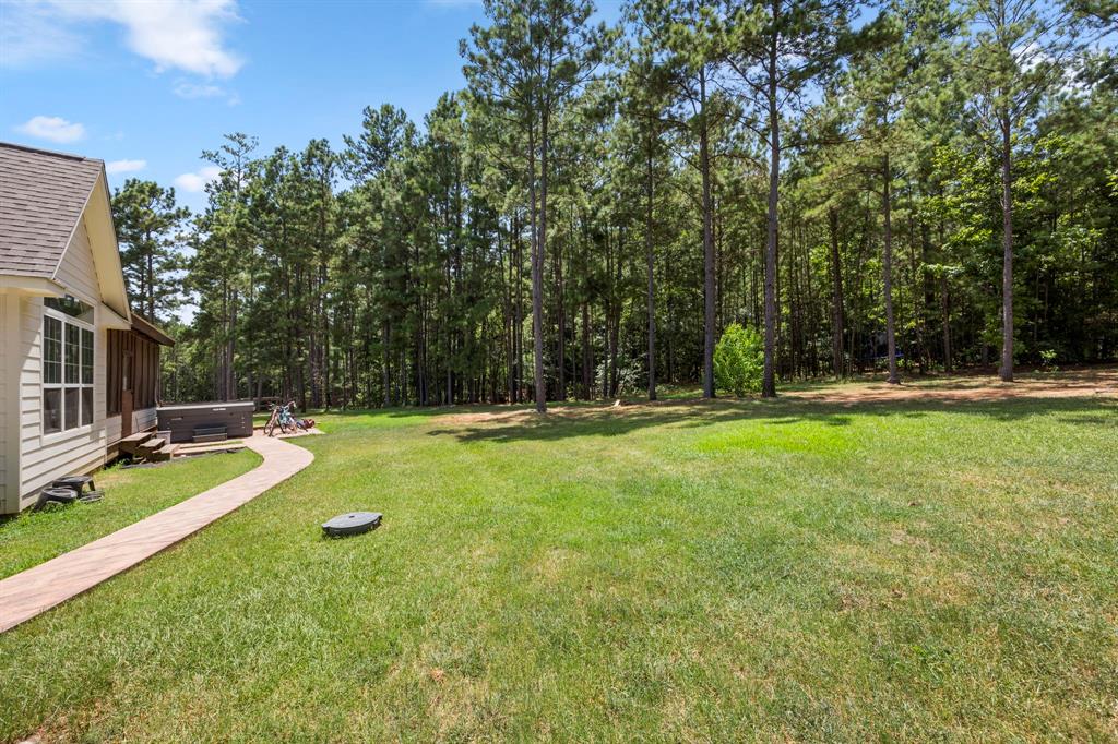 Approximately half of the 2+ acres is heavily wood. Its tranquil setting and abundance of natural beauty, make this property a special place to call home!