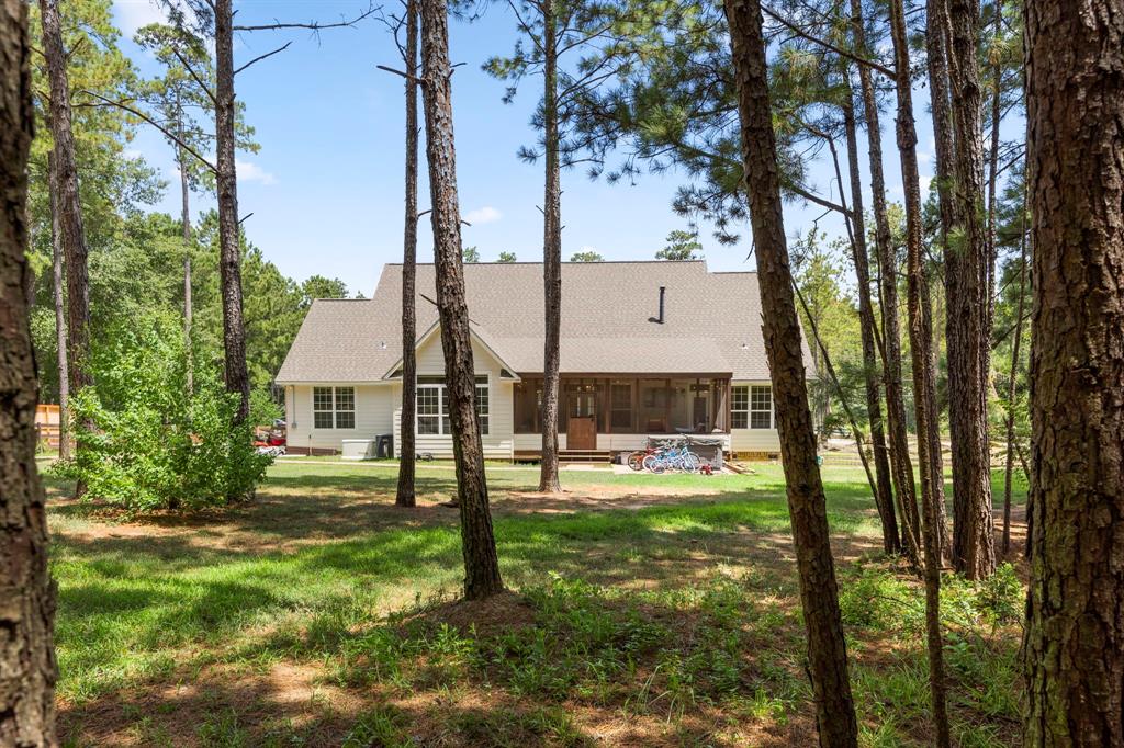 Welcome to your retreat in the woods! Rarely will you find a home so close to nature, complete with jaw-dropping views of the backyard from every angle.