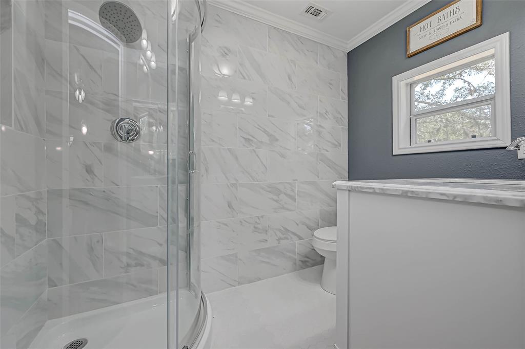 Stunning tile work and clear pretty shower, quality work done through out this home.