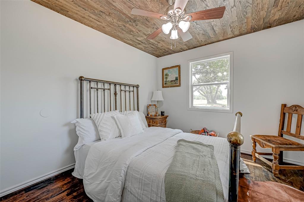 Restful nights in charming this charming bedroom.