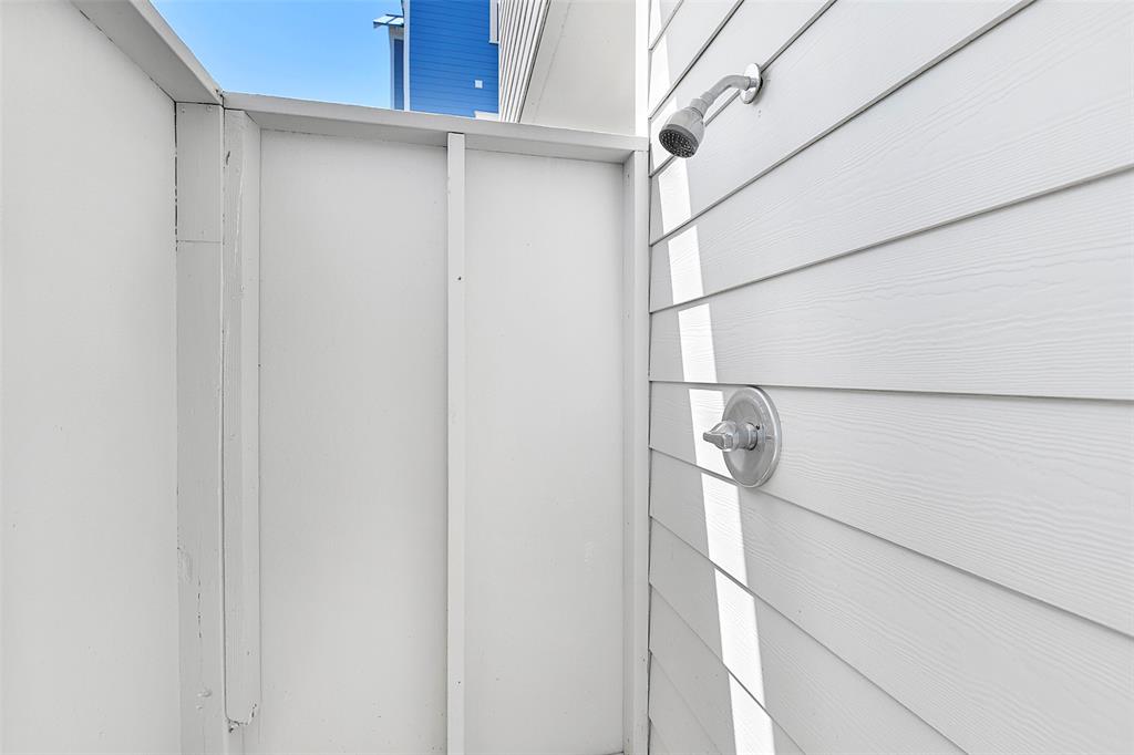 A must for every beach home is an outdoor shower.