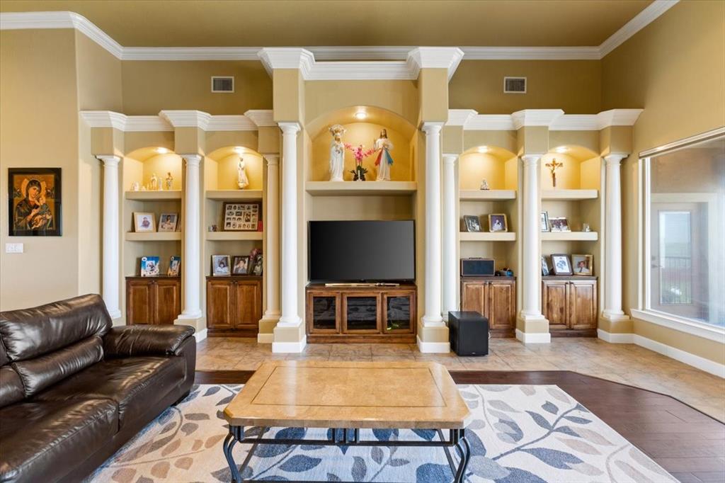 Formal Living Room With Custom Lighted Built-Ins*Gracious Columns & Shelves Makes This A One Of A Kind Wall!