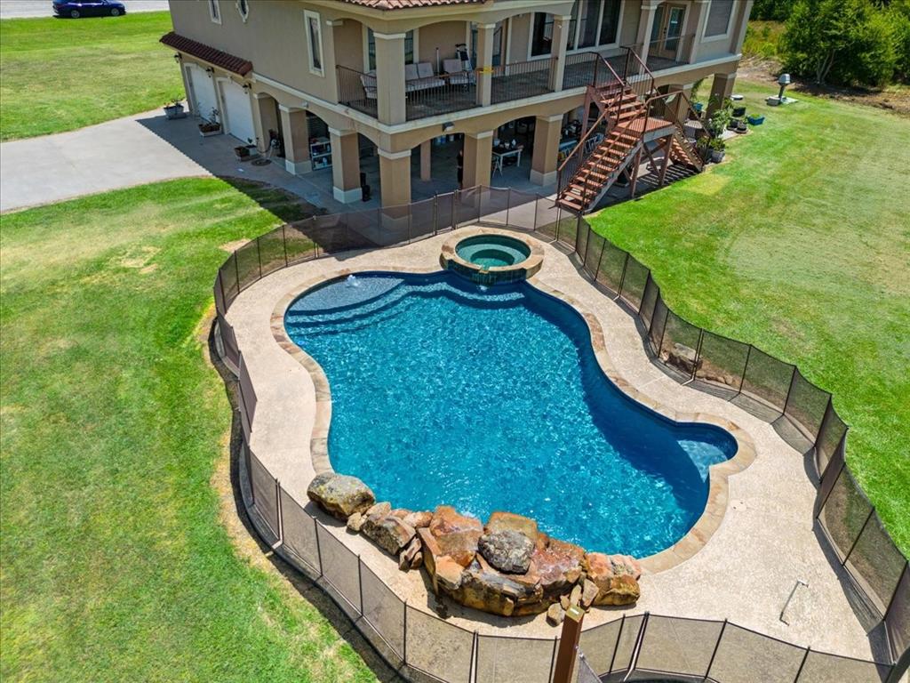 Large Pool With Waterfall*Matching Tile Around Pool Edge*Gigantic Covered Patio & Balcony.