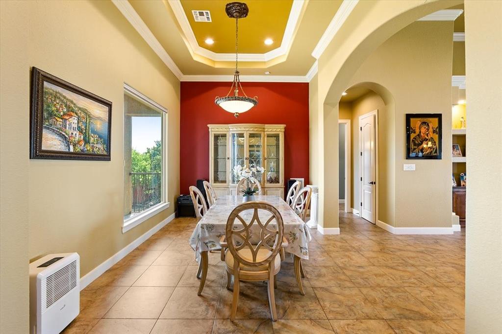 Another View Of Formal Dining Room With Arched Door Ways*Home Is Full Of Natural Light.
