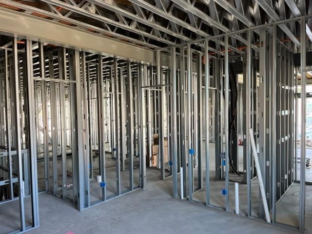 Steel construction throughout the entire building with concrete between each floor.