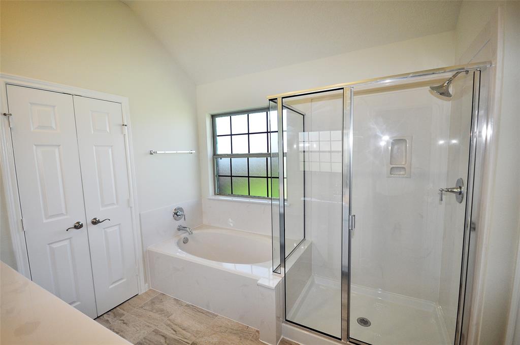 Master Bath  with soaking tub and separate shower.