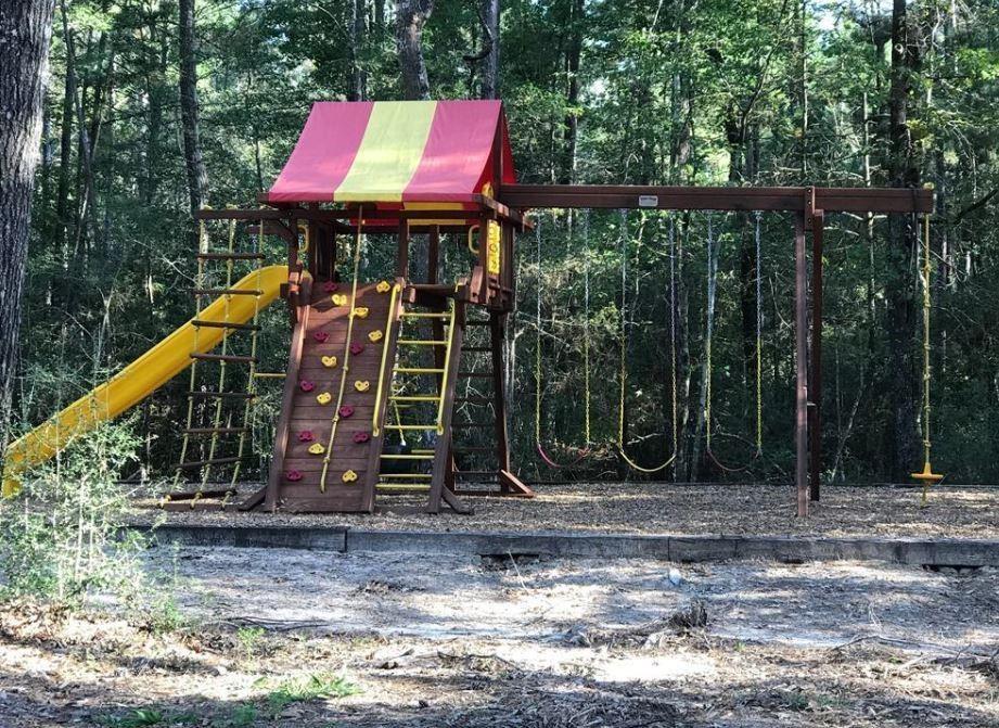 Playground nestled in the trees