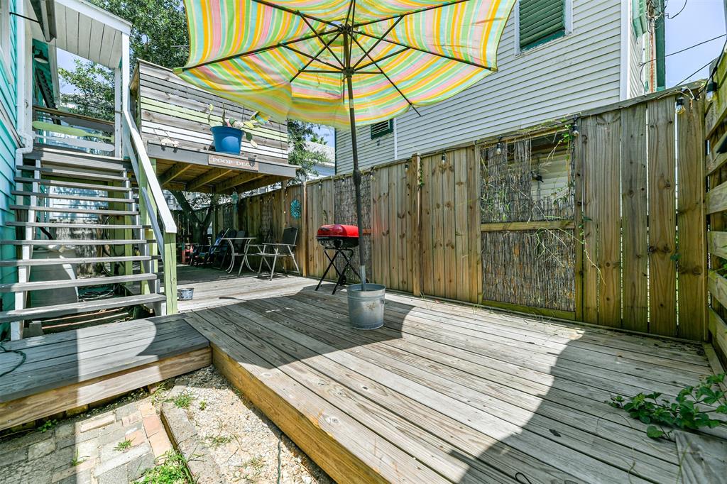 Raised wood decking and covered patio.