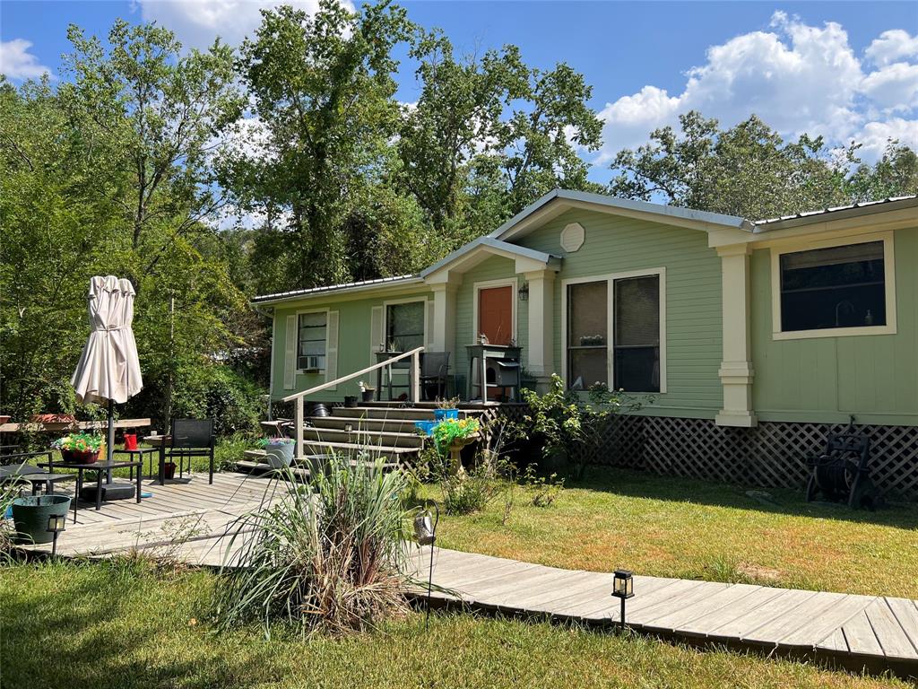439  County Road 370  Splendora Texas 77372, 52