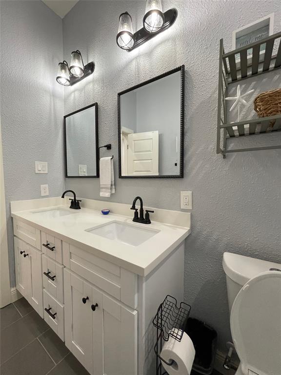 View of double vanity and accessories in bathroom
