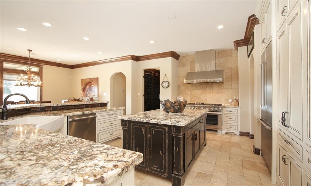 Gorgeous distress island is the perfect accent for this kitchen!