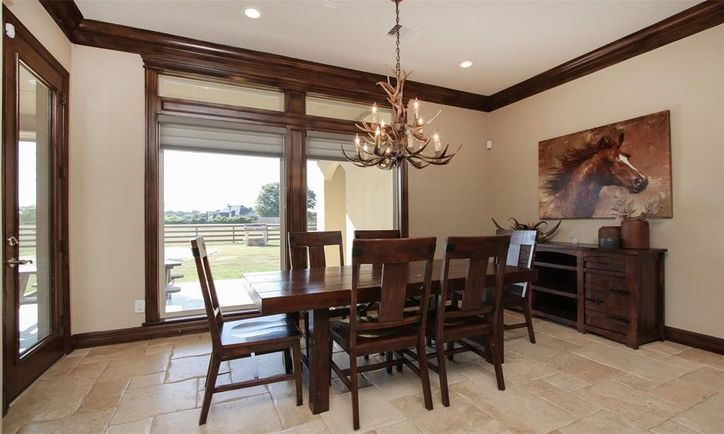The spacious breakfast room is the perfect place to enjoy your morning coffee or a nice family dinner. Features large picturesque windows that look out onto the beautiful grounds.
