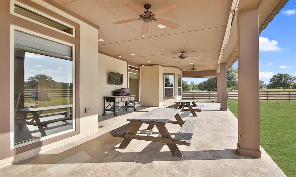 The large covered patio is large enough for all your patio furniture!
