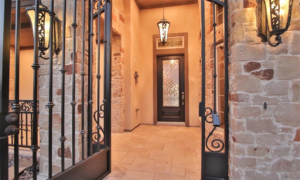 Enter your guest in style through the courtyard to the front door to this amazing house!