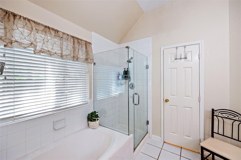 Primary bath with separate shower and soaker tub