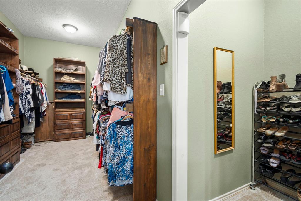 MASTER CLOSET WITH BUILT IN DRESSERS
