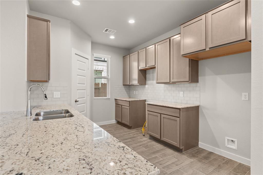 Plan 145 features 3 bedrooms, 2 full baths, 1 half bath and over 2,100 square feet of living space.
