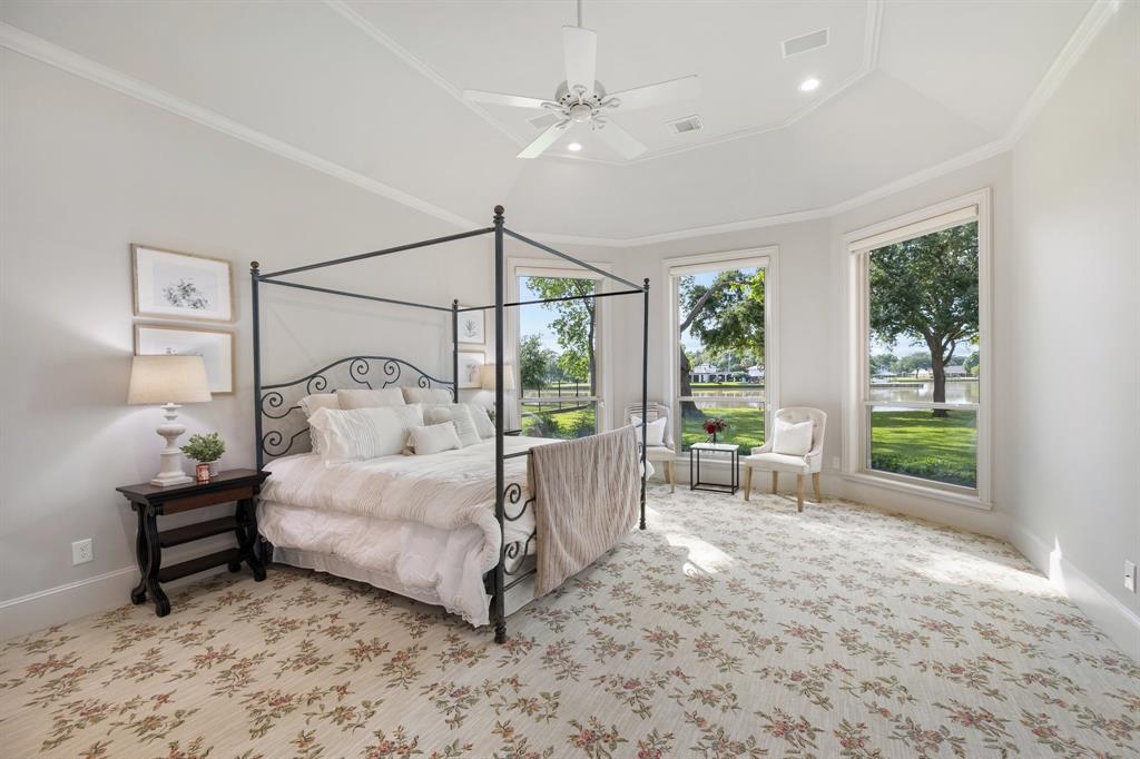 Primary bedroom proides the perfect space to rela and recharge.  This intimate spae is quiet with serene views to set your intention each morning.
