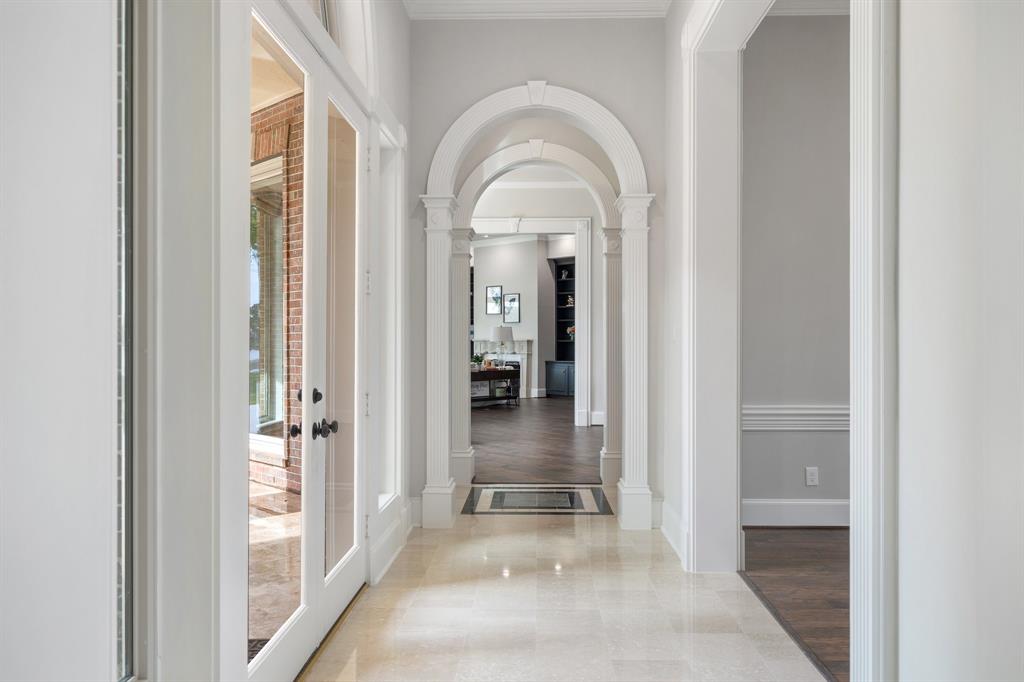 We love the details in the archways through the downstairs hallway. Stunning.