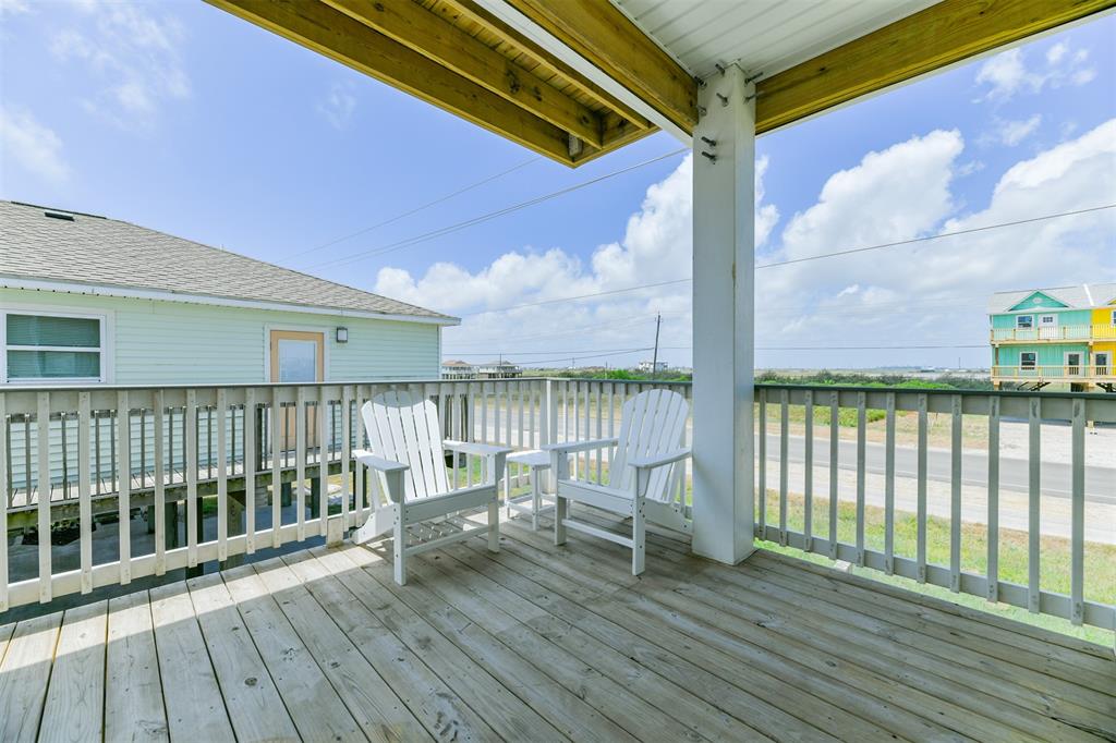 The covered back deck offers a great place to take refuge from the sun!