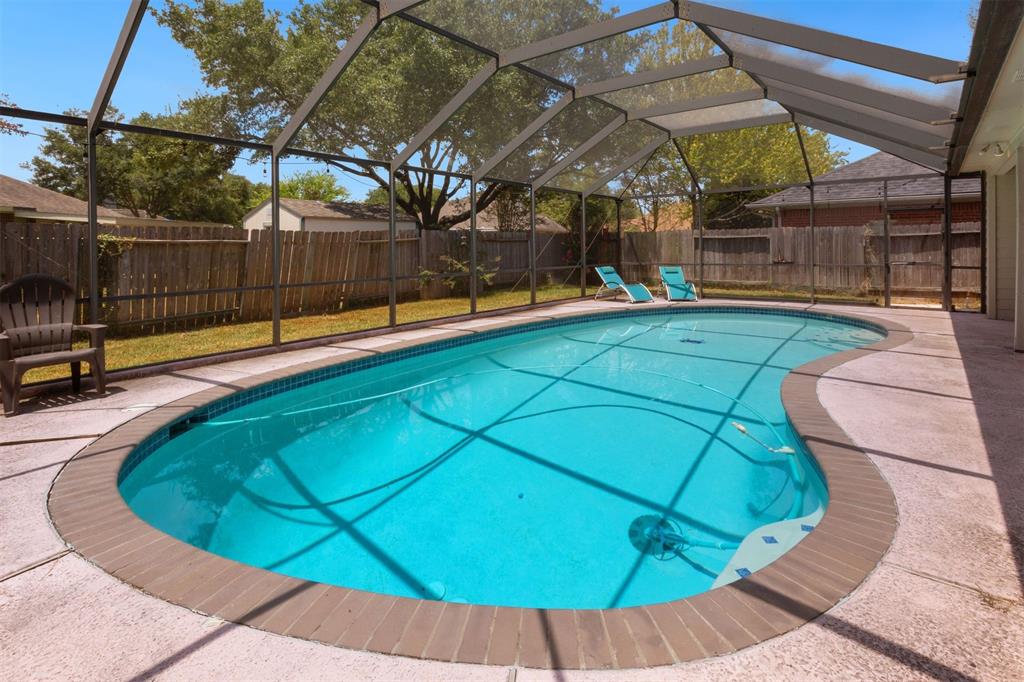 Super screen enclosed pool and back yard patio area.  This helps to keep the bugs and mosquitoes out as you enjoy your backyard and pool area.