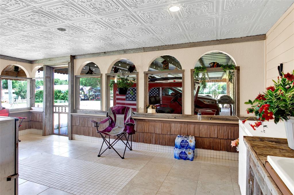 Back screened in patio just off the back of the home for lots of privacy and a covered parking area.