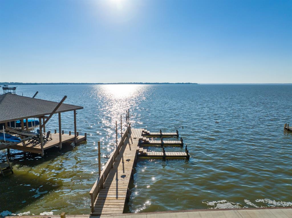 Includes 3 boat slips and fishing pier