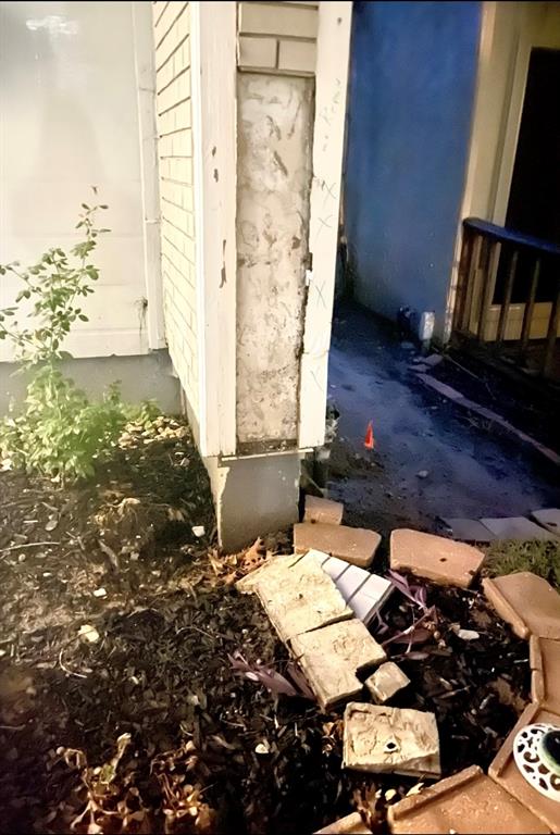 Damaged area at the front entry.