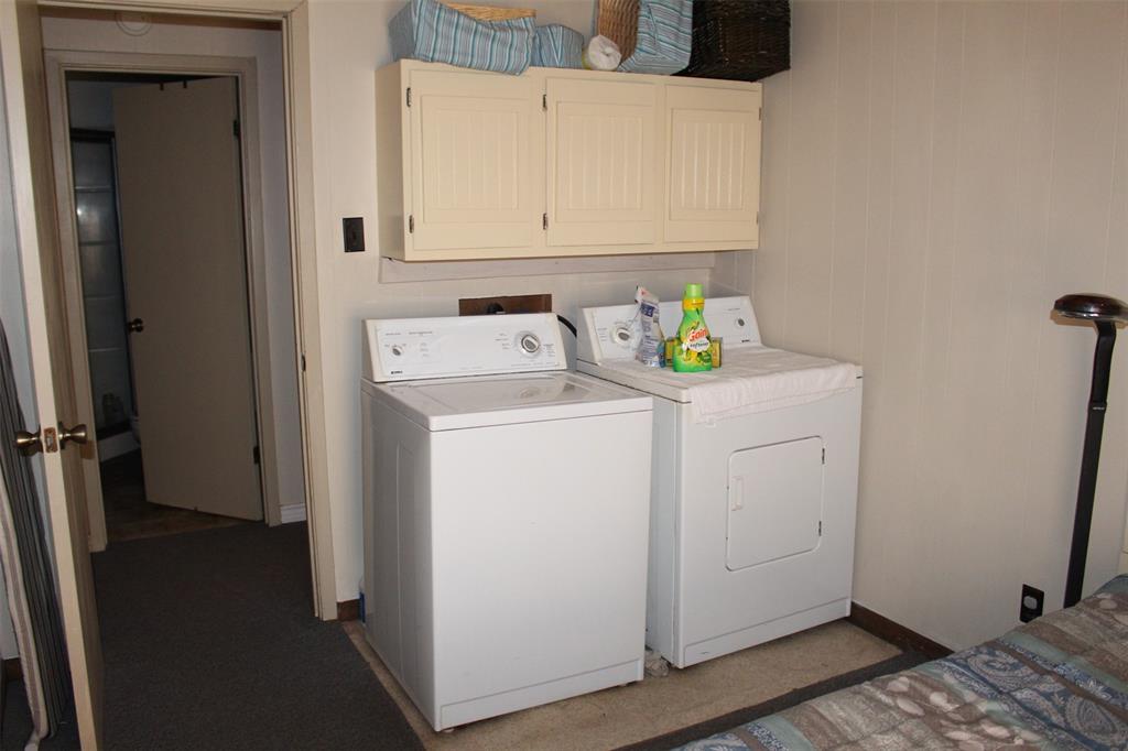 Washer and Dryer conveniently located across from guest bath.