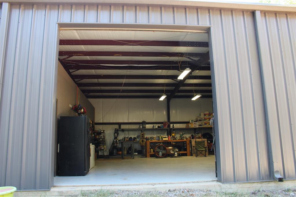 3, 12ft roll up doors, welcome you in to this amazing shop.