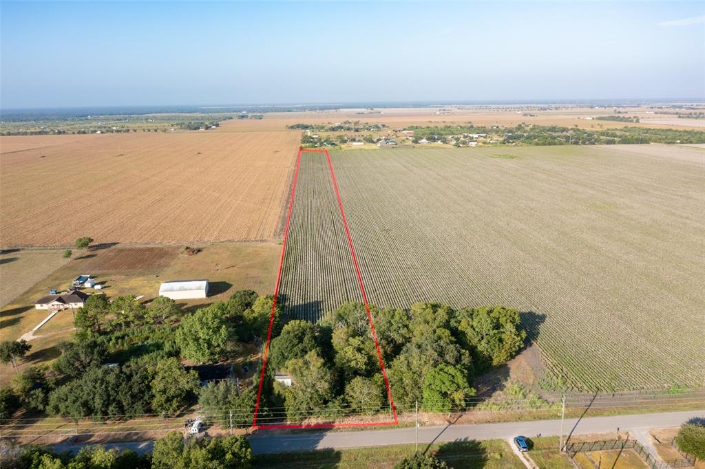 +/- 13.07 Acres with an old house that is a tear down.  Please do not attempt to enter the house.  Property is in agricultural exemption, with the exception of the 1 acre where the house is and is planted in cotton currently