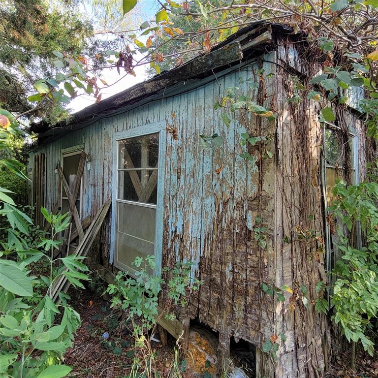 Old house on the property.  As you can see, it is in rough shape.  Please DO NOT attempt to enter the house!