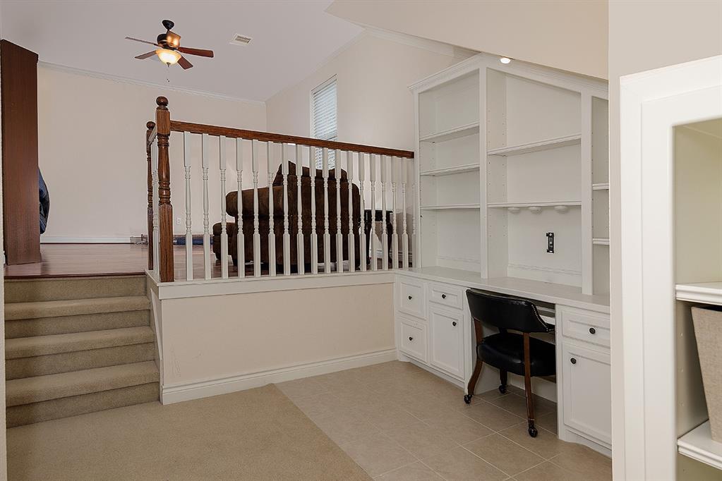 Built-in desk in the 3rd floor living area - step up to a dance studio/exercise area/flex space