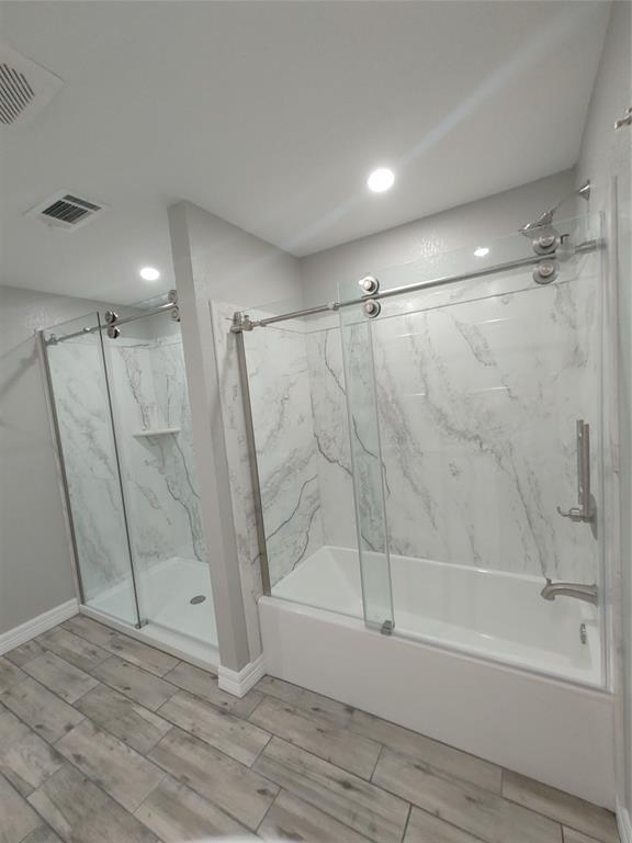 MAIN SEPARATE SHOWER AND TUB AREA