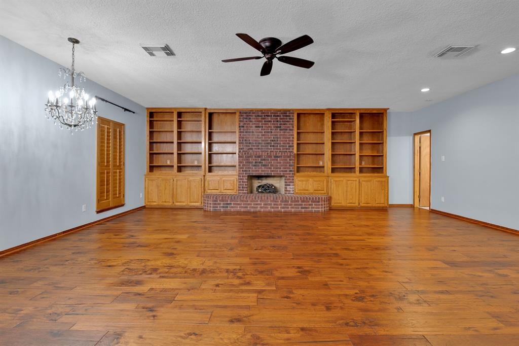 9 foot ceilings throughout the entire property with beautiful wood cabinets in almost every room.