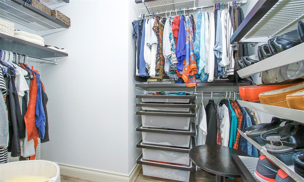 The walk in closet has great hanging and shelving spaces.