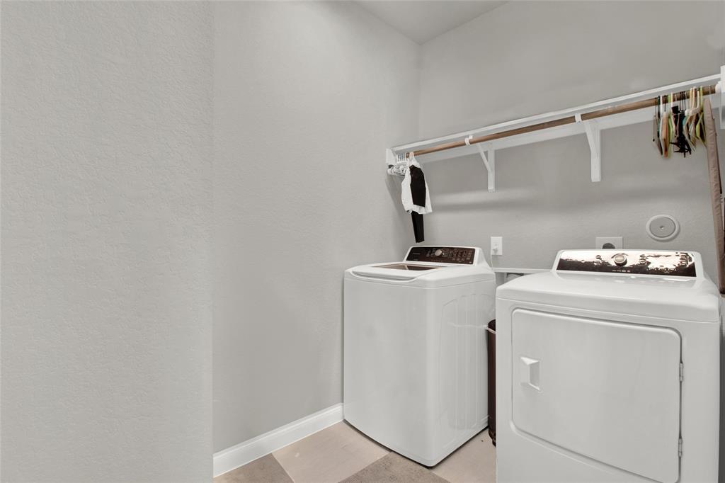 Large laundry room with space for storage