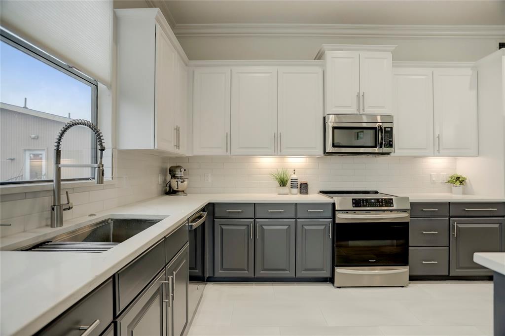 State-of-the-art appliances a stainless steel sink/faucet make this kitchen fit for the chef in your family.