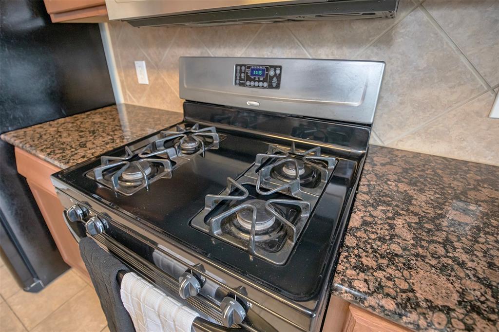 The kitchen has a wonderful gas stove that any cook will love.