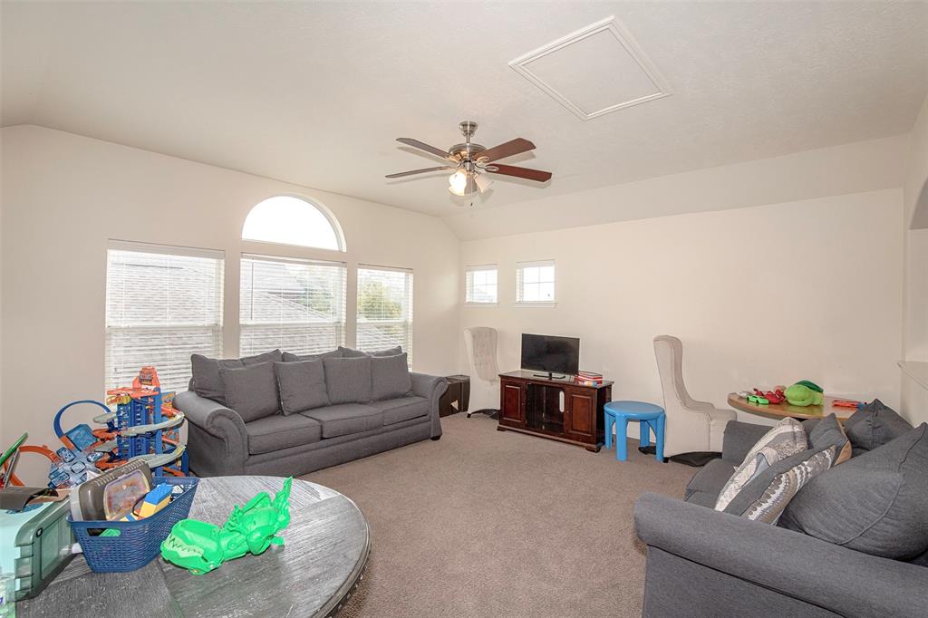 Spacious game room is a great secondary family room.
