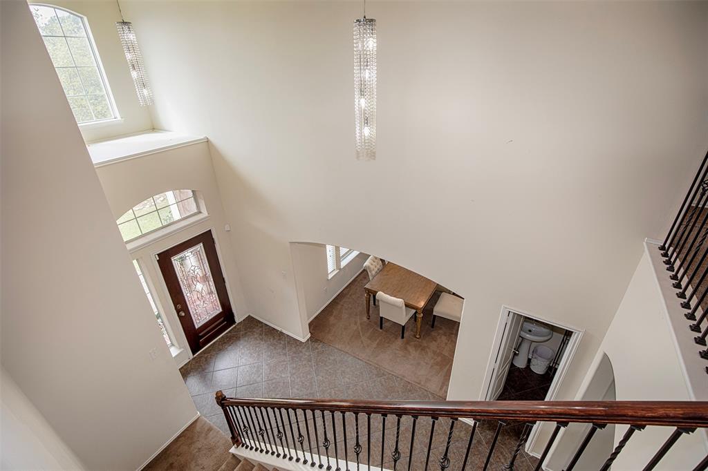 As you enter the home you are welcomed with a grand, two-story entryway.