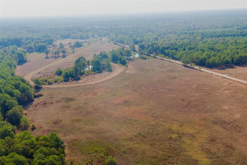 Great Opportunity! 78+ acres of land, in an excellent location for residential/commercial development. Unrestricted land, partially cleared, level, and no flood zone! Perfect for developers, close to Conroe, I45 & 105. Livestock are currently on the premises. Images for all diagrams are approximate. Appointments required.