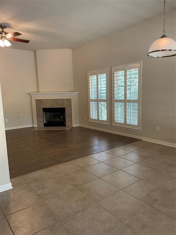 Open concept living/dining area with gas fireplace
