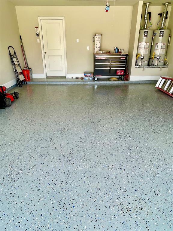 Epoxy 2 car garage.  Upgraded to move the water heaters to ground level for convince.