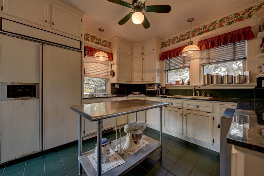 Full Kitchen with 3 ovens, one is convection oven, steam cleaning dishwasher, side-by-side refrigerator, gas cook top, griddle
