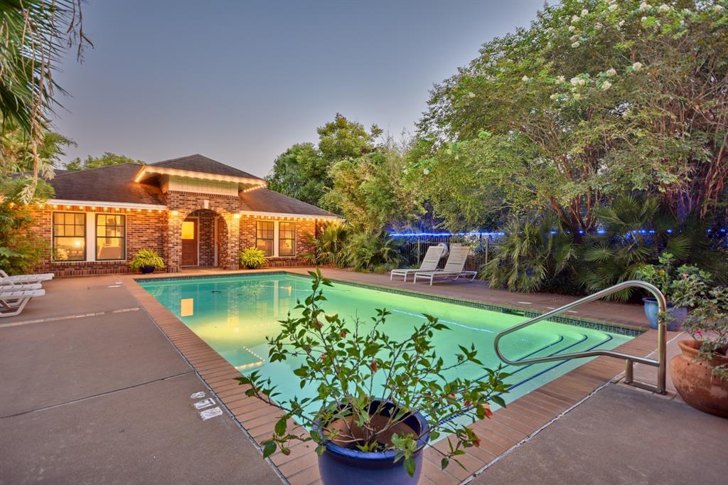 Beautiful Pool Area with Outdoor Kitchen Pavillion and Grounds with meandering pathways