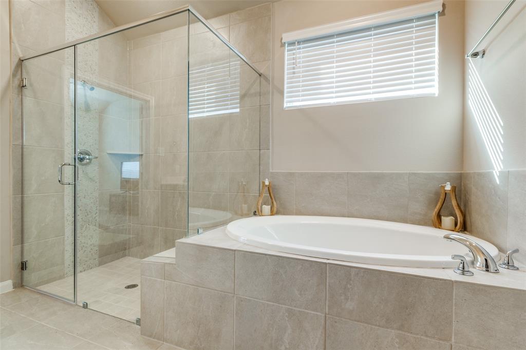 extended shower with soaking tub