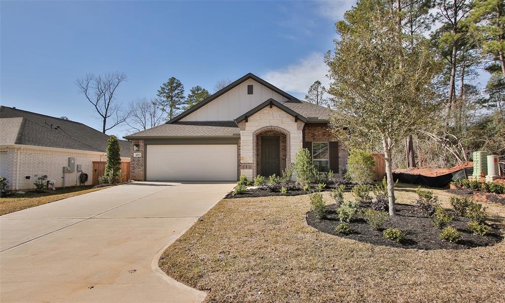 215 Butterfly Orchid Court, Willis, TX 