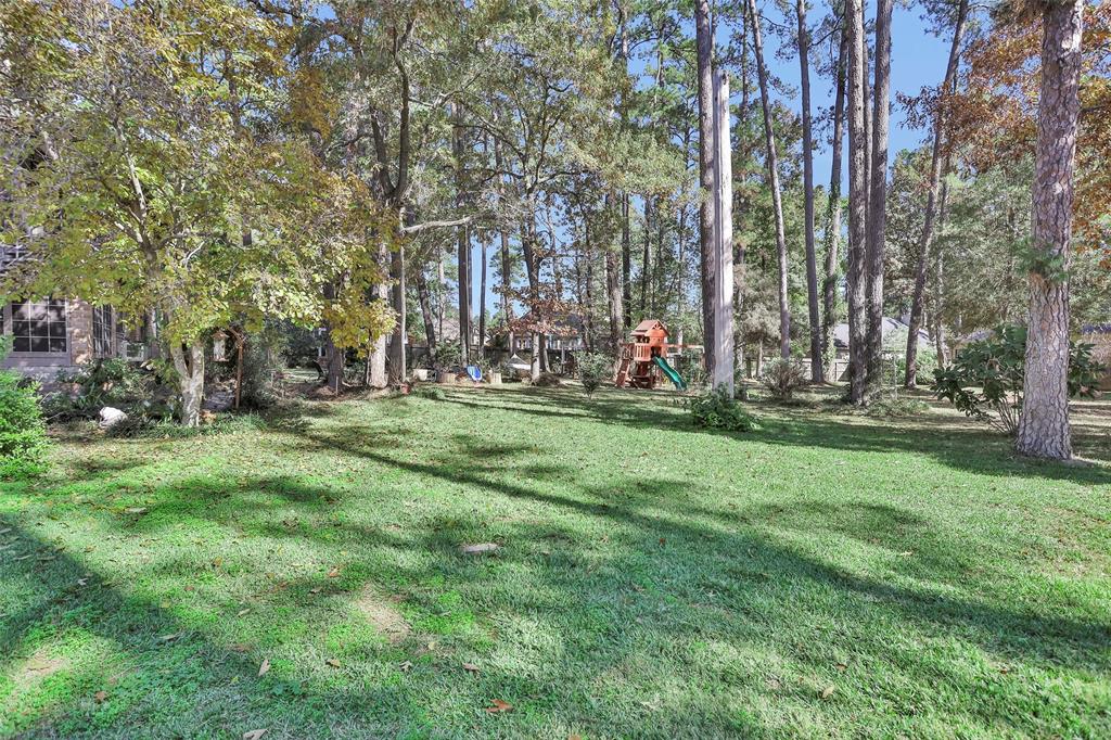 This adjacent lot is also available for purchase to the buyer of the home.  Ask for pricing, etc. Huge lot with mature trees and plenty of open space for a pool!