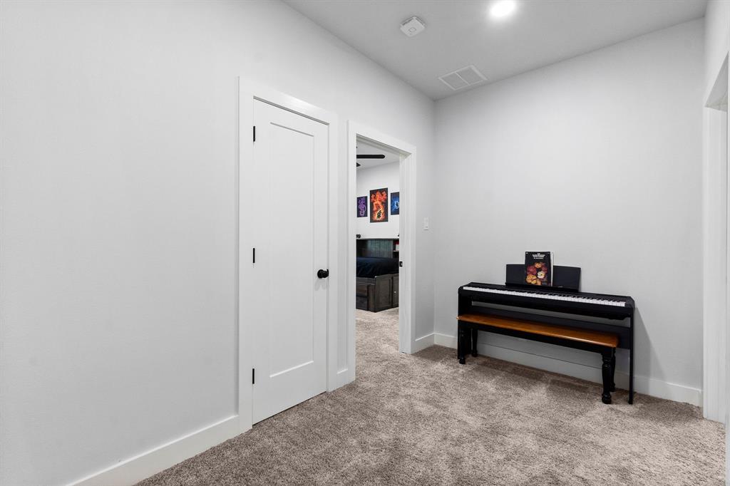 This upstairs hallway has a linen closet, leads to Bedrooms #3 and #4 along with a 4th door (not seen here) that leads to the walk-in attic with a tremendous amount of storage space.